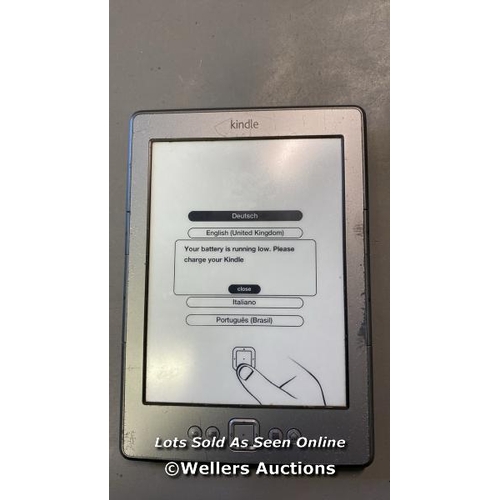 9564 - AMAZON KINDLE/ MODEL D01100 / POWERS UP