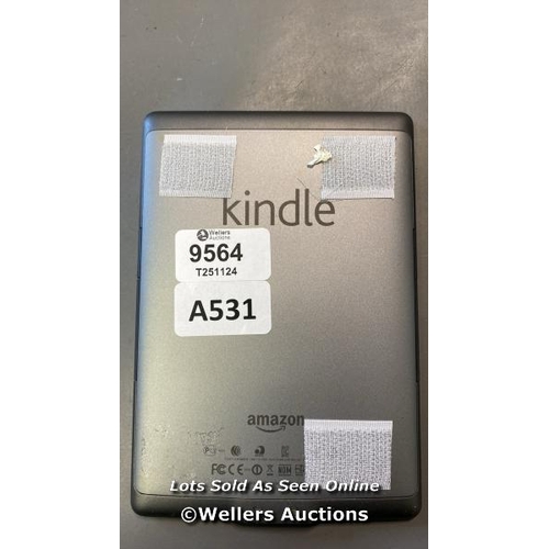 9564 - AMAZON KINDLE/ MODEL D01100 / POWERS UP