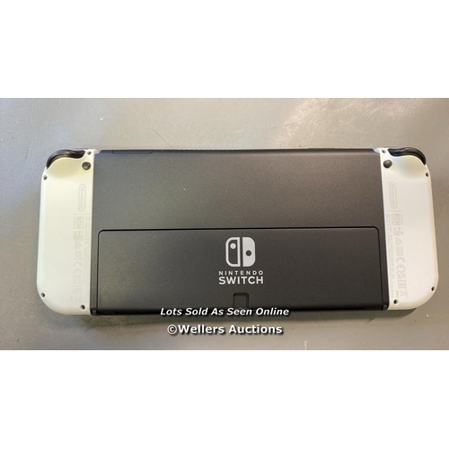 9660 - PRE OWNED NINTENDO SWITCH / MODEL HEG-001/ SN: XTJ10479713387 WITH CONTROLLER X2 + CASE