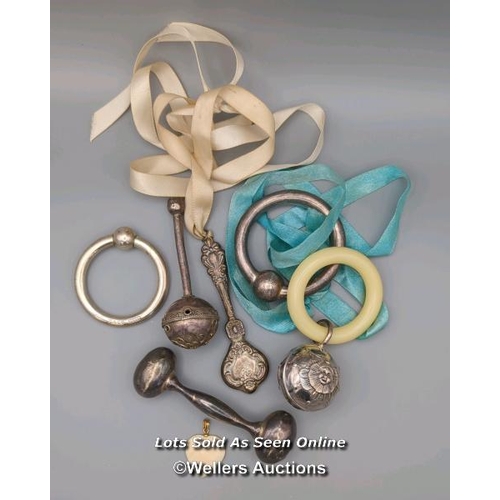 19 - A collection of baby rattles and teething rings, one stamped T & Co, along with costume jewellery in... 