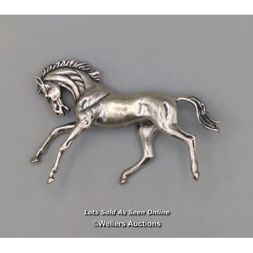 6 - Solid silver horse model stamped 925, gross weight 79g. Length 8.5cm, height 5.5cm.