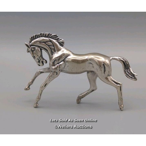 6 - Solid silver horse model stamped 925, gross weight 79g. Length 8.5cm, height 5.5cm.