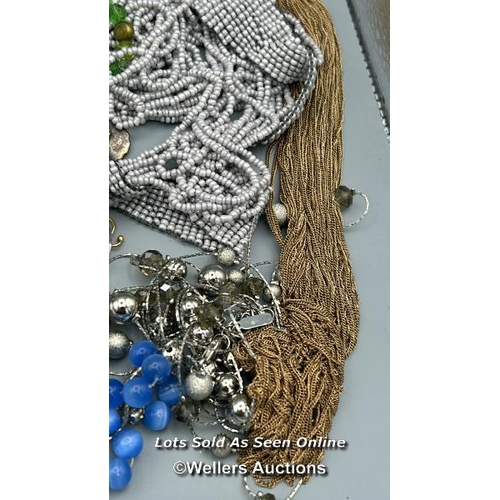 47 - Costume jewellery to include beaded necklaces, bracelets, yellow metal multi chain necklace and Furl... 