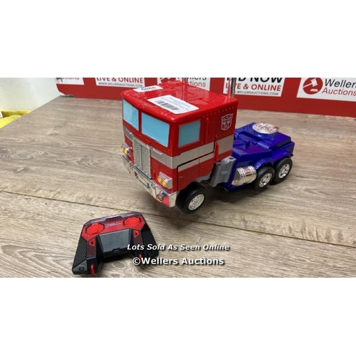 6088 - JADA TRANSFORMERS AUTOBOT OPTIMUS PRIME CONVERTING RC / POWERS UP / MINIMAL SIGNS OF USE / DOES NOT ... 