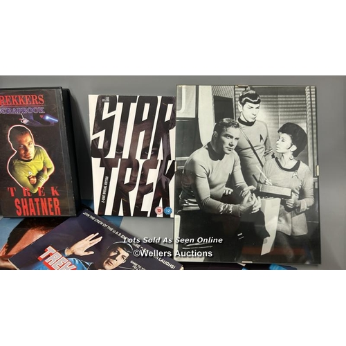 164 - Star Trek - a large collection of lobby cards, movie stills, postcards, DVD's, patches and badges