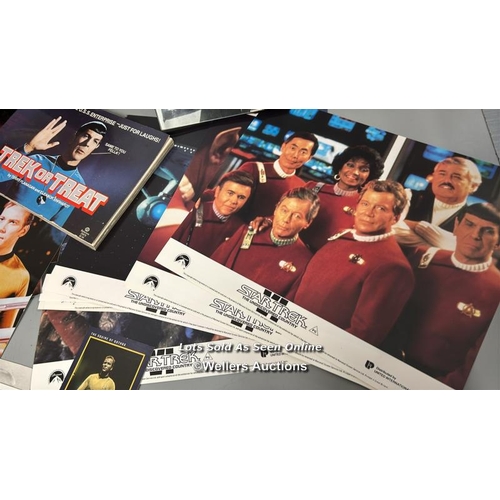 164 - Star Trek - a large collection of lobby cards, movie stills, postcards, DVD's, patches and badges