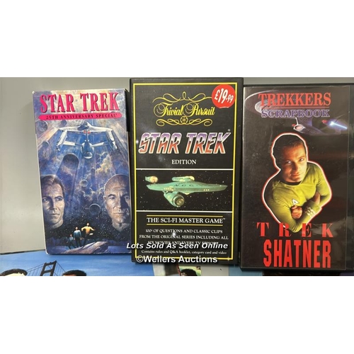 164 - Star Trek - a large collection of lobby cards, movie stills, postcards, DVD's, patches and badges