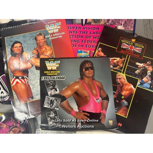 171 - WWF Wrestling / Bret Hart - memorabilia including three Bret hart signed pictures, books, collectabl... 