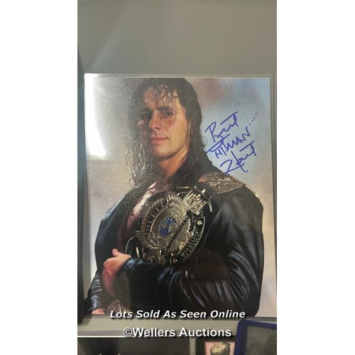 171 - WWF Wrestling / Bret Hart - memorabilia including three Bret hart signed pictures, books, collectabl... 