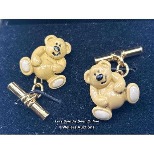 71 - A pair of enamel teddy bear cufflinks on yellow metal with a white metal costume jewellery brooch.