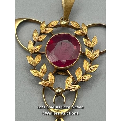 80 - A vintage 1920's 18ct gold pendant with circular and oval synthetic rubies, length 6cm, gross weight... 