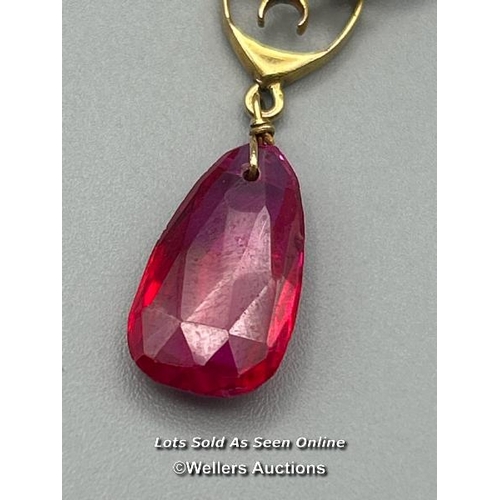 80 - A vintage 1920's 18ct gold pendant with circular and oval synthetic rubies, length 6cm, gross weight... 