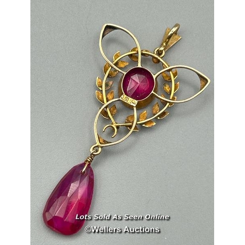 80 - A vintage 1920's 18ct gold pendant with circular and oval synthetic rubies, length 6cm, gross weight... 