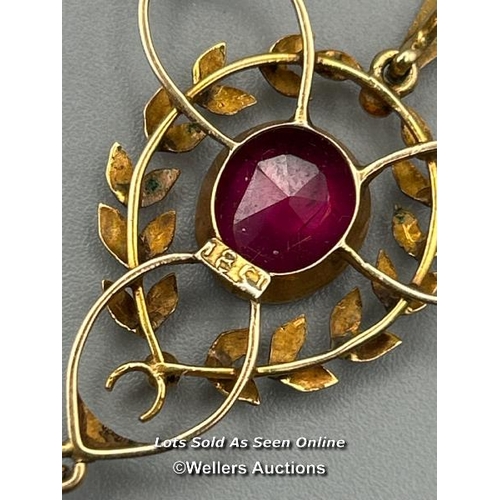 80 - A vintage 1920's 18ct gold pendant with circular and oval synthetic rubies, length 6cm, gross weight... 