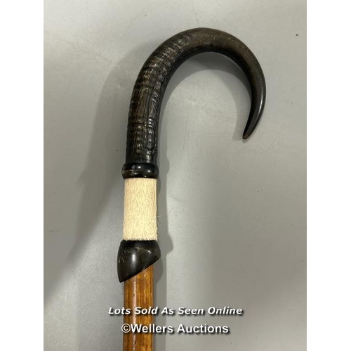 188 - Alpine walking stick, with Ibex horn handle and carved foot, faint makers name and brass tip. 82 cm ... 