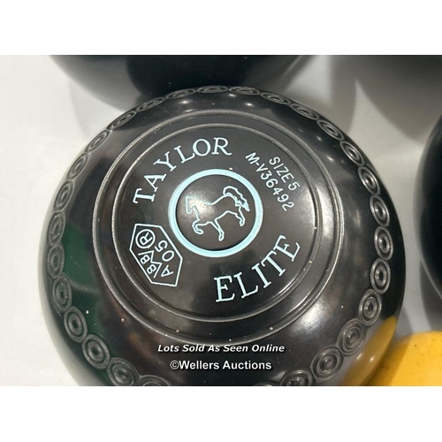 8 - A set of four Taylor Elite lawn bowls size 5, M-V36492 with bag / T38