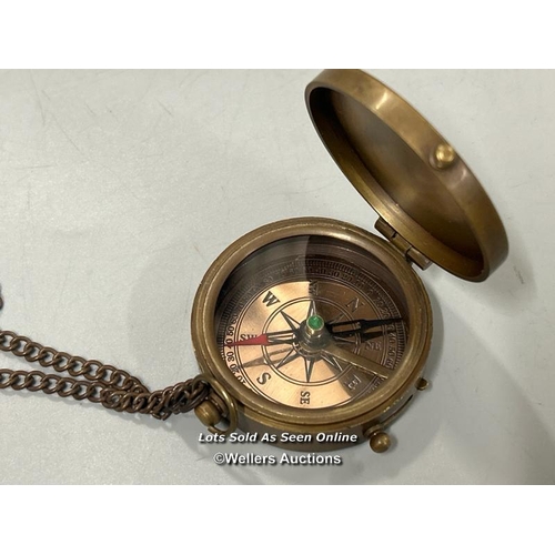 262 - Small brass effect compass with case / AN49