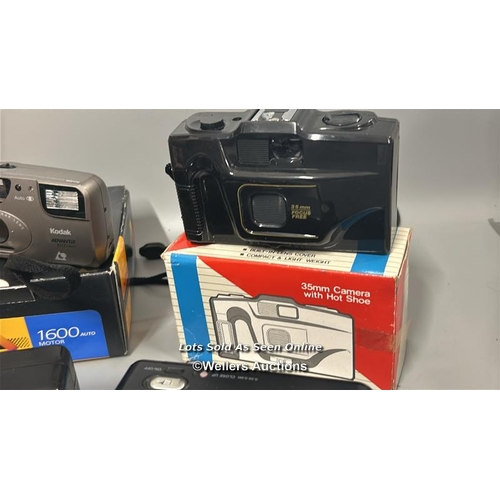 275 - A group of seven 35mm cameras including Kodak 1600 Auto, Polaroid Joycam, Konica A4 and Pentax PC35A... 