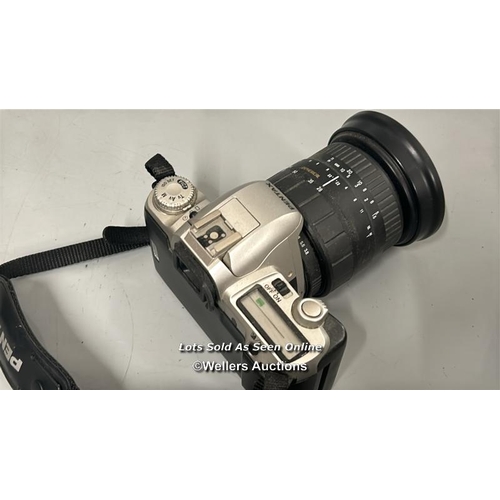 277 - Pentax MZ-50 35mm camera with Sigma Zoom 28-200mm lens and Praktica 35mm camera with Skylight 39mm -... 