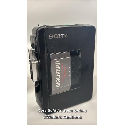 282 - Camera accessories including a boxed Vivitar Teleconverter along with a Sony Walkman model WM-B12 / ... 