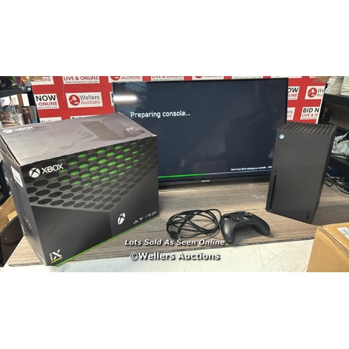 8311 - XBOX SERIES X 1TB SSD IN BLACK / POWERS UP, APPEARS NEW OPEN BOX (TV NOT INCLUDED)