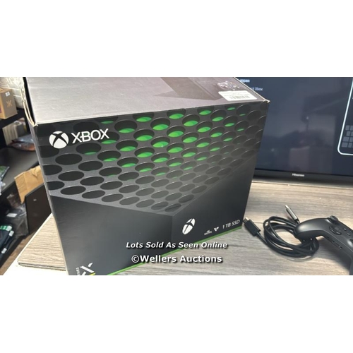 8312 - XBOX SERIES X 1TB SSD IN BLACK / POWERS UP, APPEARS NEW OPEN BOX (TV NOT INCLUDED)