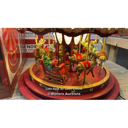 31 - 17 INCH (43.1CM) MARQUEE DELUXE CHRISTMAS CAROUSEL WITH 240 LED LIGHTS AND SOUNDS (2023) / APPEARS N... 