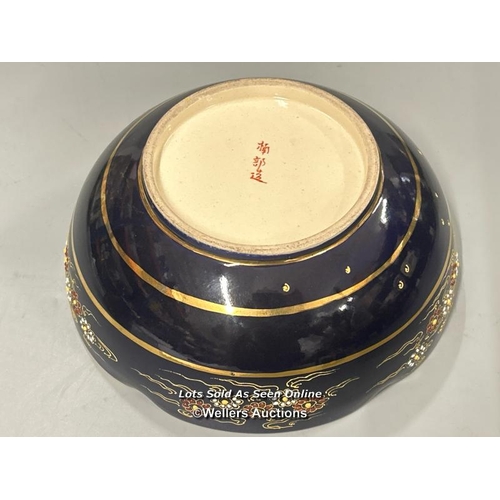 10 - Japanese Satsuma bowl with scalloped rim and dark blue glaze decorated with gilt detailed figures an... 