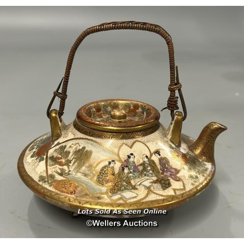 11 - A small Japanese saki / tea pot of squat form with cover and detailed gilt decoration, makers mark t... 