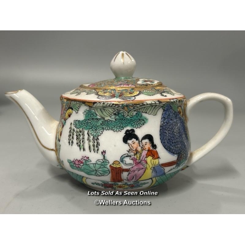 17 - A modern chinese part tea service comprising tea pot, two cups and tray / AN4