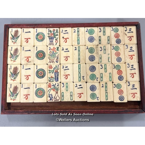 39 - Vintage Mahjong set, c1920's. Bone and bamboo tiles in a wood and brass mounted five drawer case and... 