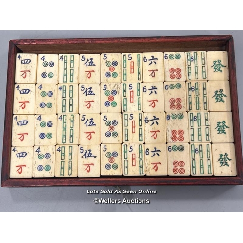 39 - Vintage Mahjong set, c1920's. Bone and bamboo tiles in a wood and brass mounted five drawer case and... 