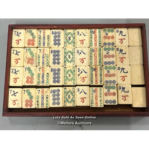 39 - Vintage Mahjong set, c1920's. Bone and bamboo tiles in a wood and brass mounted five drawer case and... 