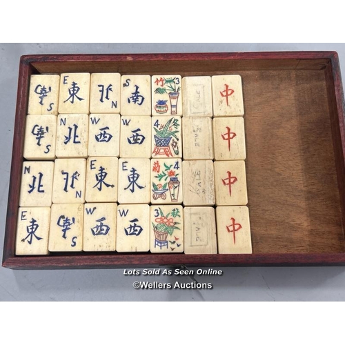 39 - Vintage Mahjong set, c1920's. Bone and bamboo tiles in a wood and brass mounted five drawer case and... 