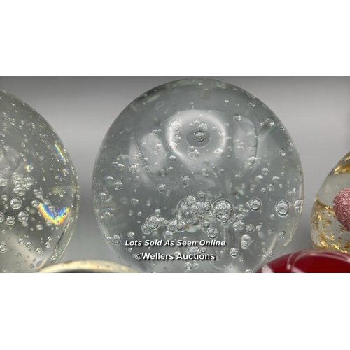 45 - Eight glass paperweights and a glass butterfly decoration / AN8