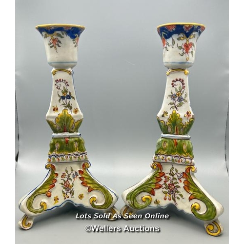 53 - A pair of colourful porcelain candlesticks, 24.5cm high / AN9