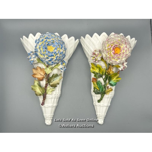 56 - A pair of floral wall pocket vases, 20cm high / AN9