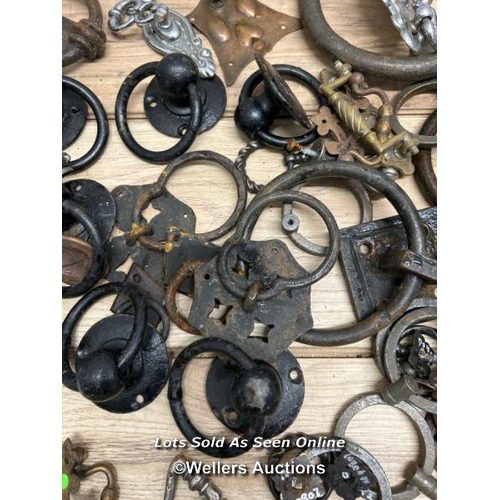 336 - Large quantity of door knockers