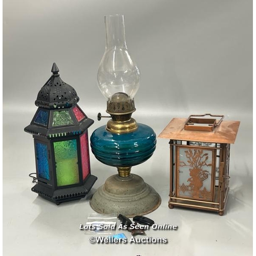 92 - Vintage oil lamp with blue glass reservoir, 38cm high and two modern candle lamps / AN23