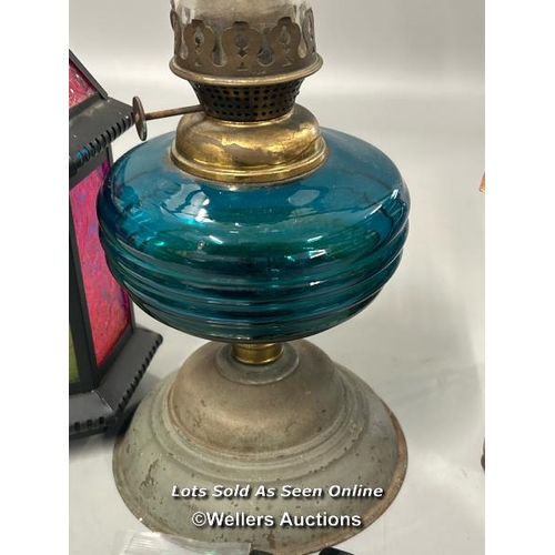 92 - Vintage oil lamp with blue glass reservoir, 38cm high and two modern candle lamps / AN23