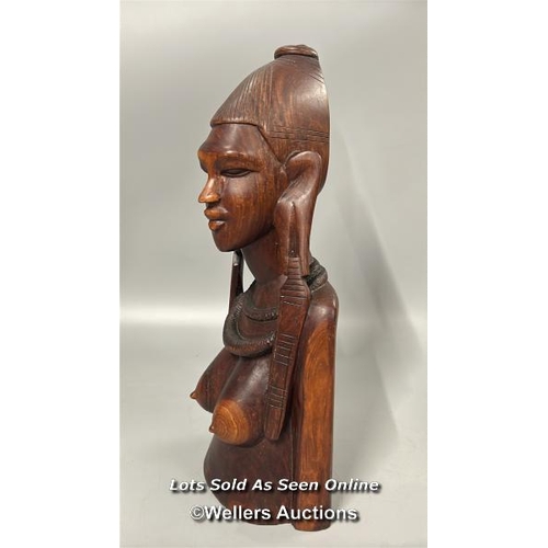 94 - Large mahogany carved tribal bust of a woman, 42cm high with four assorted carved wood Cats, largest... 