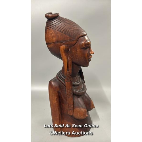 94 - Large mahogany carved tribal bust of a woman, 42cm high with four assorted carved wood Cats, largest... 