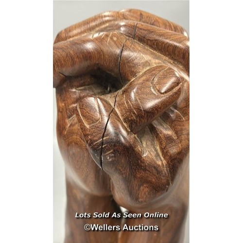 95 - Large carved wooden sculpture of praying hands on a seperate wooden base, 46cm high, base 24.5cm wid... 