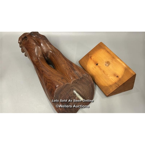 95 - Large carved wooden sculpture of praying hands on a seperate wooden base, 46cm high, base 24.5cm wid... 