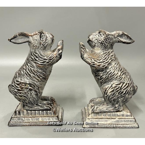 96 - A pair of cast painted cast iron Rabbit bookends, 18.5cm high / AN24