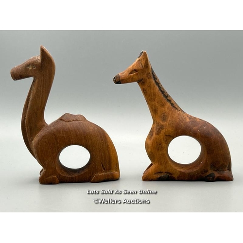 146 - Twelve carved wood napkin rings from Kenya in the form of animals / AN48