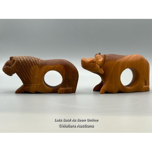 146 - Twelve carved wood napkin rings from Kenya in the form of animals / AN48