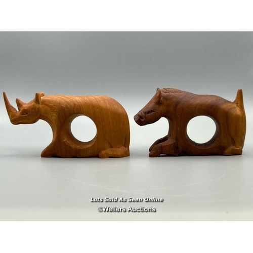 146 - Twelve carved wood napkin rings from Kenya in the form of animals / AN48