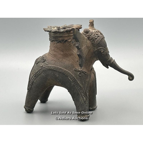 147 - Three brass dhokra cast Elephants from Orissa including one as a candle holder, tallest 9cm high / A... 