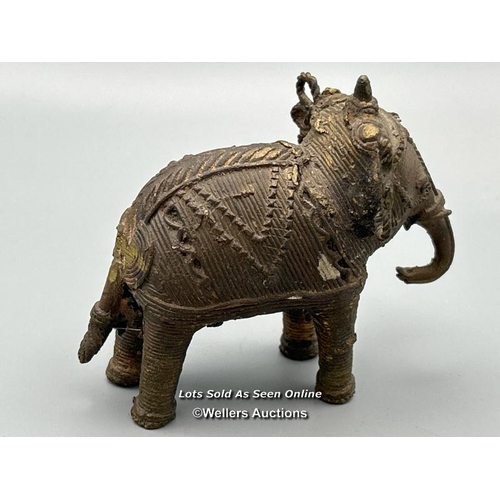 147 - Three brass dhokra cast Elephants from Orissa including one as a candle holder, tallest 9cm high / A... 